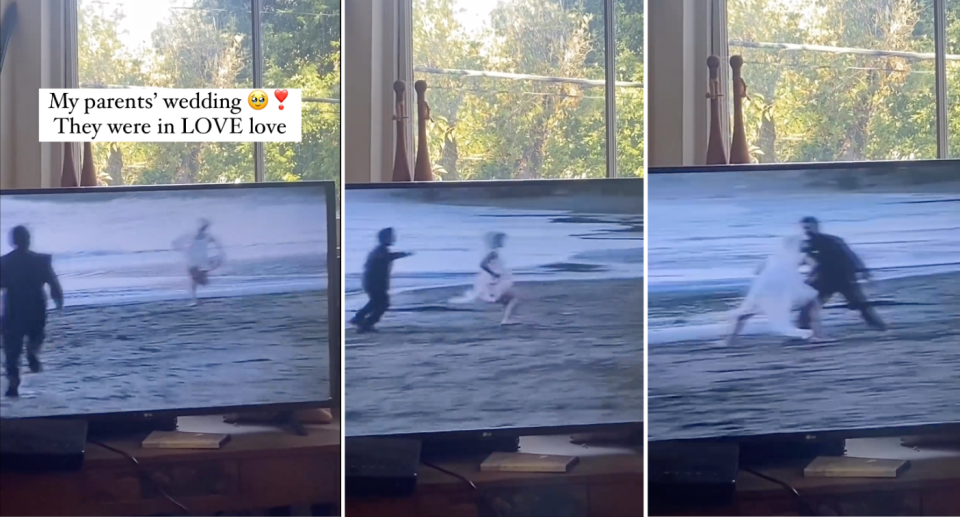 Bride running down the beach as groom chases after her.