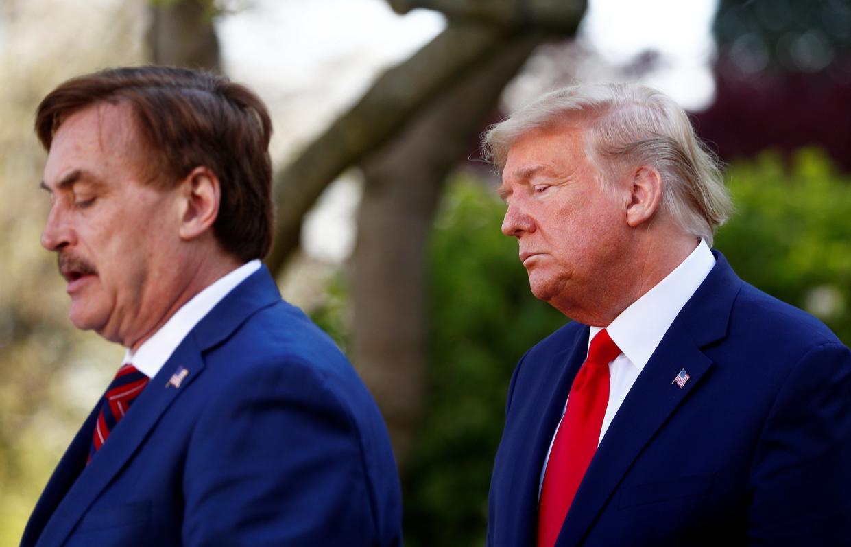 My Pillow CEO Michael Lindell speaks as U.S. President Donald Trump listens during the daily coronavirus response briefing in the Rose Garden at the White House in Washington, U.S., March 30, 2020. (REUTERS)