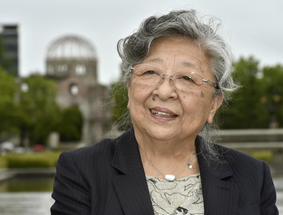 Koko Kondo speaks at Hiroshima Peace Memorial Park with a backdrop of Atomic Bomb Dome in Hiroshima, western Japan, on June 6, 2018. Kondo, who survived the blast of the first atomic bomb as a baby, is the daughter of the Rev. Kiyoshi Tanimoto, one of six atomic bomb survivors featured in John Hersey's book “Hiroshima.” She struggled for decades until she reached middle age to overcome the pain she experienced in her teens and the rejection by her fiance. She was almost 40 when she decided to follow her father's path and become a peace activist. She was inspired by his last sermon, in which he spoke about devoting his life to Hiroshima's recovery. (Kyodo News via AP)