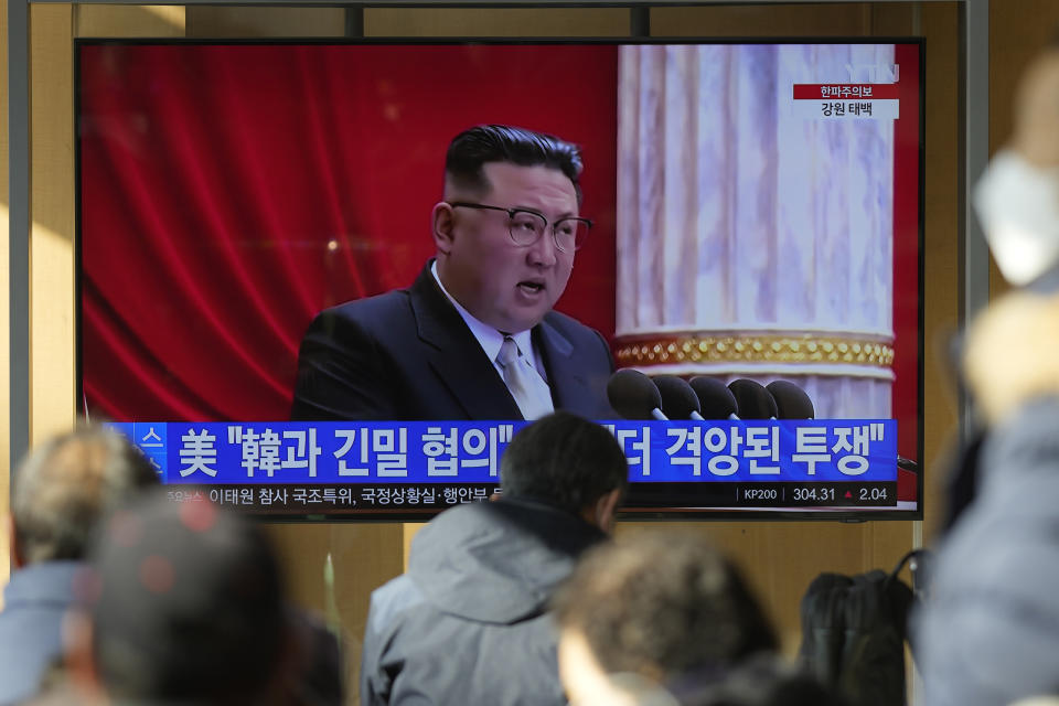 A TV screen shows a news program reporting with footage of North Korean leader Kim Jong Un in Pyongyang, at the Seoul Railway Station in Seoul, South Korea, Tuesday, Dec. 27, 2022. North Korean leader Kim called for stronger effort to overcome hardships and challenges facing his country as he opened a key political meeting after carrying out a record number of missile tests this year. (AP Photo/Lee Jin-man)