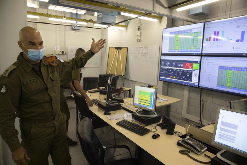 Maj. Gen. Ori Gordin, head of the Israeli army’s Home Front Command, gestures as he speaks at its headquarters, in Ramle, Central Israel, Tuesday, Aug. 25, 2020. Gordin is overseeing the military’s coronavirus “task force,” formed in August to bring one of the developed world’s worst outbreaks under control. Its main responsibility is taking the lead in contact tracing and breaking chains of infection. (AP Photo/Sebastian Scheiner)