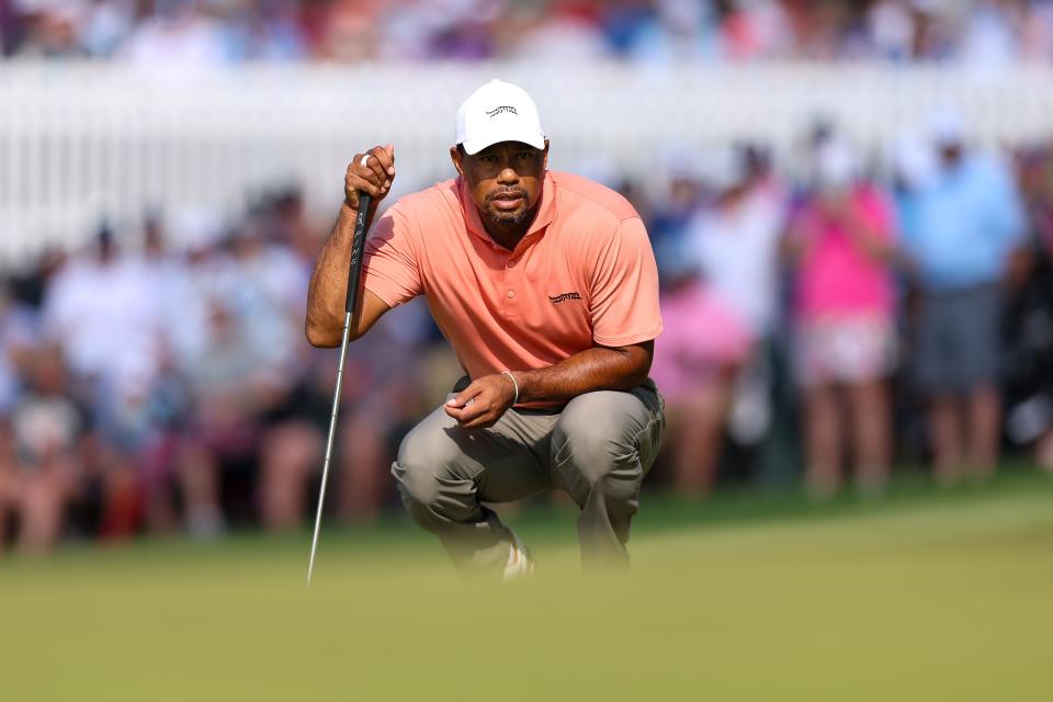 LOUISVILLE, KENTUCKY - MAY 16: Tiger Woods of the United States lines up a putt on the 14th green during the first round of the 2024 PGA Championship at Valhalla Golf Club on May 16, 2024 in Louisville, Kentucky. (Photo by Christian Petersen/Getty Images)