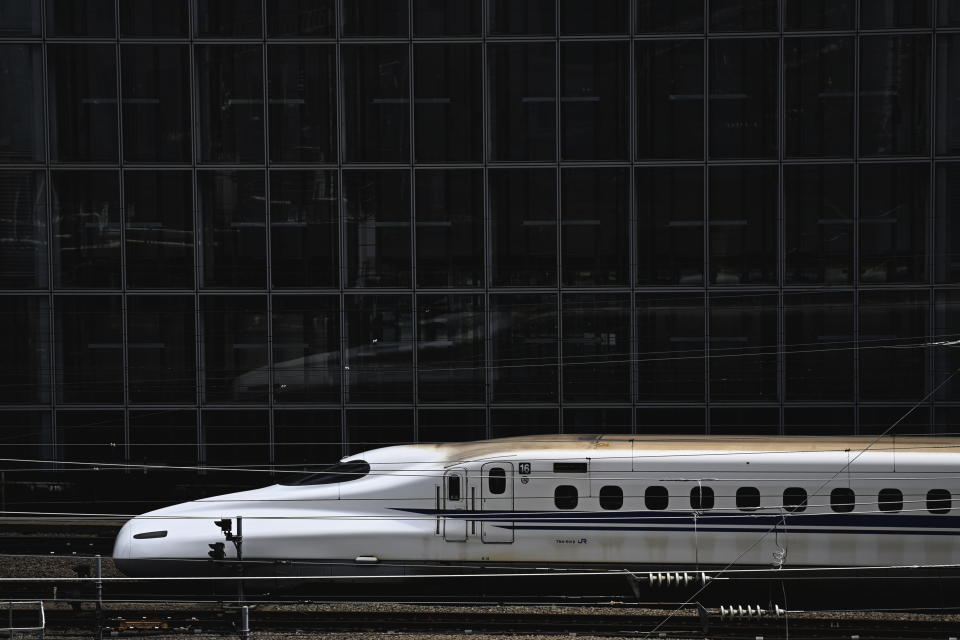 A Shinkansen Bullet-Train arrives to the Tokyo Station in Tokyo, Japan