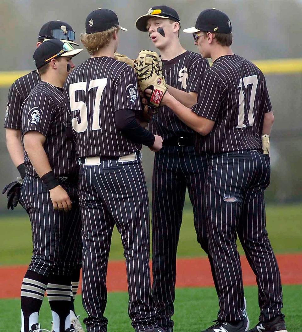 South Cenral infielders meet with pitcher Michael Sanders during baseball action between South Central and Hillsdale a Hillsdale Friday April 26,2024. Steve Stokes/for Ashland Times-Gazette