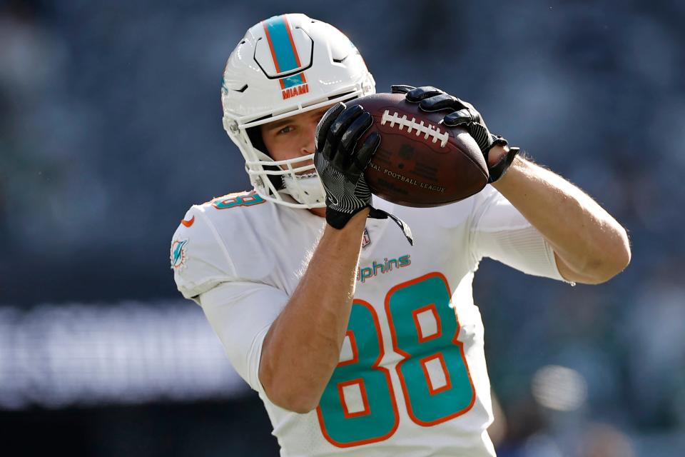 Miami Dolphins tight end Mike Gesicki (88) warms up before taking on the New York Jets during an NFL football game, Sunday, Nov. 21, 2021, in East Rutherford, N.J. (AP Photo/Adam Hunger)