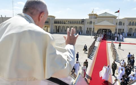 Pope Francis waves to Abu Dhabi's Crown Prince Mohammed bin Zayed al-Nahya - Credit: AFP