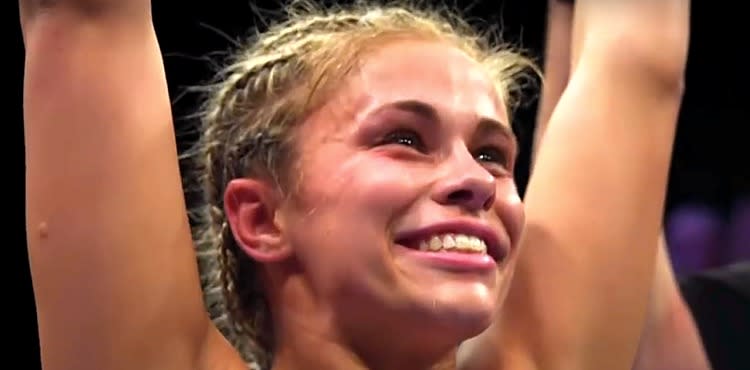 Paige VanZant with arms raised in UFC victory