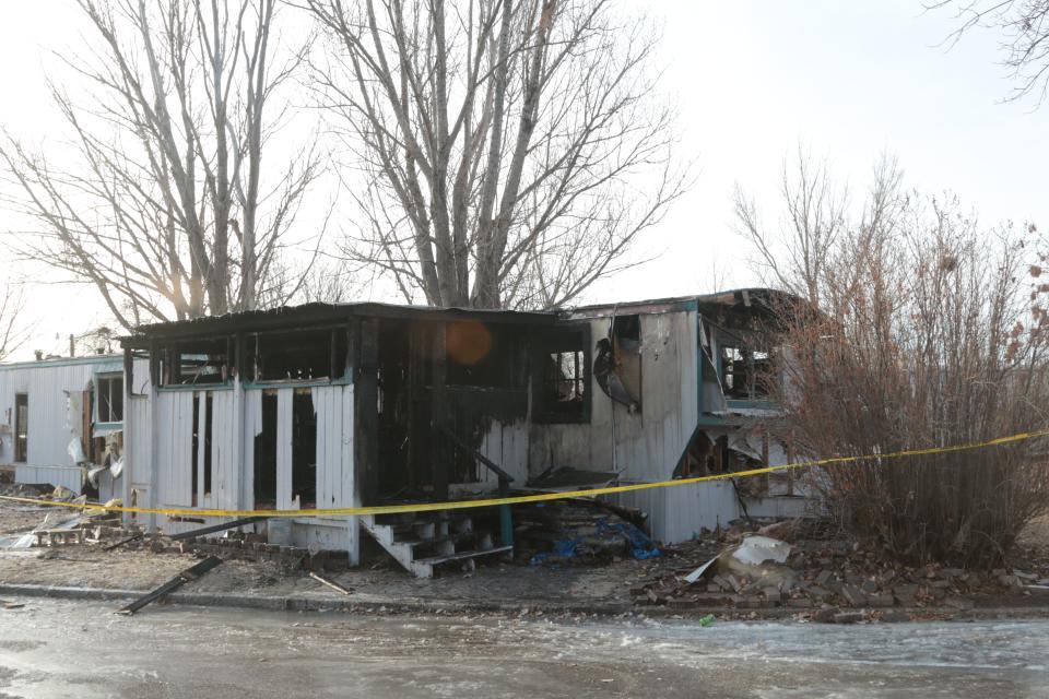 The outer walls are all that remain on this mobile home on First Curve at Lakeside Estates Thursday morning after.