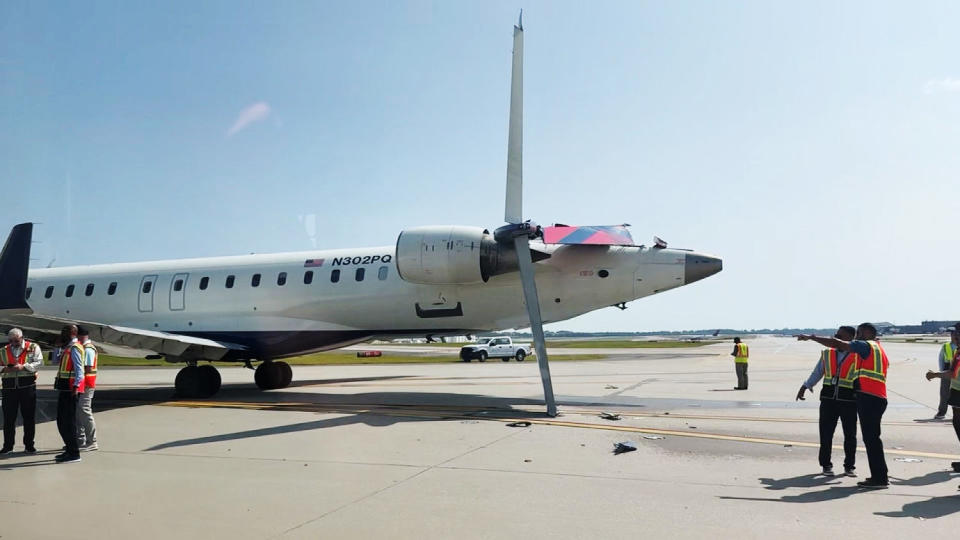 A damaged Endeavor Air plane on the tarmac at Hartsfield-Jackson Atlanta International Airport. (Nathan Pike/KSHB)