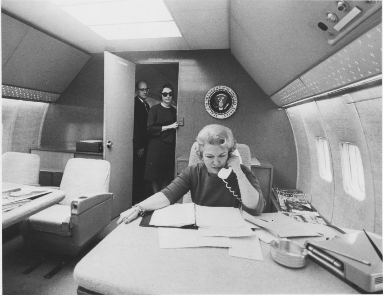 Liz Carpenter in action on Air Force One. The former journalist worked for the Johnsons in Washington D.C. for nine years, most prominently as Lady Bird Johnson's press secretary and chief of staff.