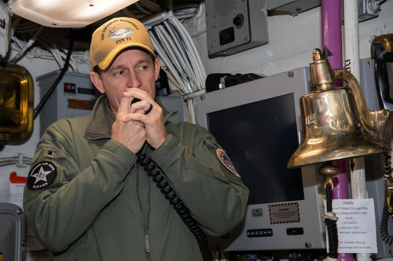 Captain Brett Crozier, commanding officer of the U.S. Navy aircraft carrier USS Theodore Roosevelt, addresses the crew in San Diego