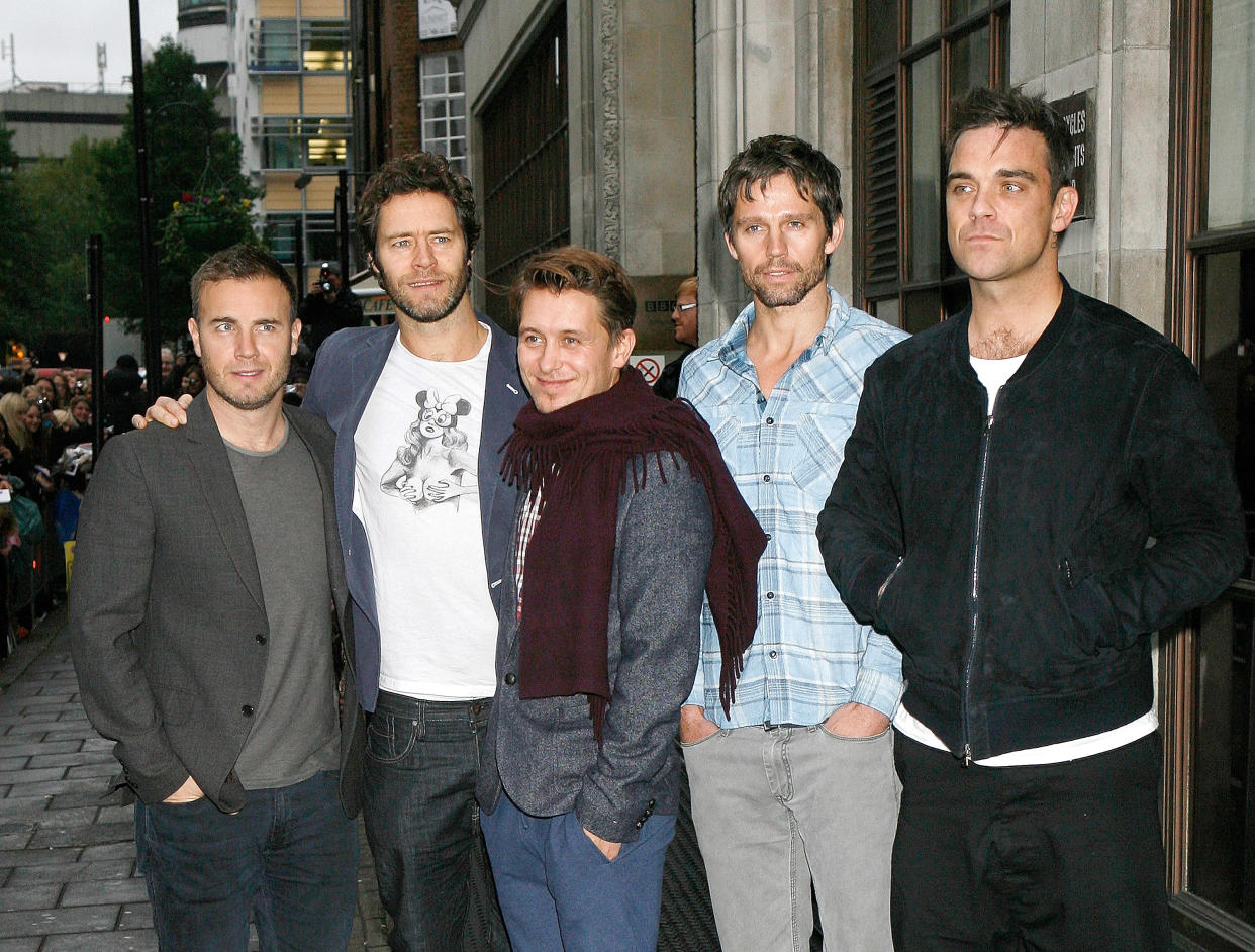 Gary Barlow, Howard Donald, Mark Owen, Jason Orange and Robbie Williams leaving Radio 1 in central London. for Chris Moyles Interview at BBC  Radio One, London on October 27,2010. Empics  