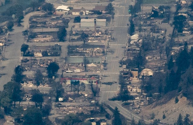 Structures destroyed by wildfire are seen in Lytton, British Columbia