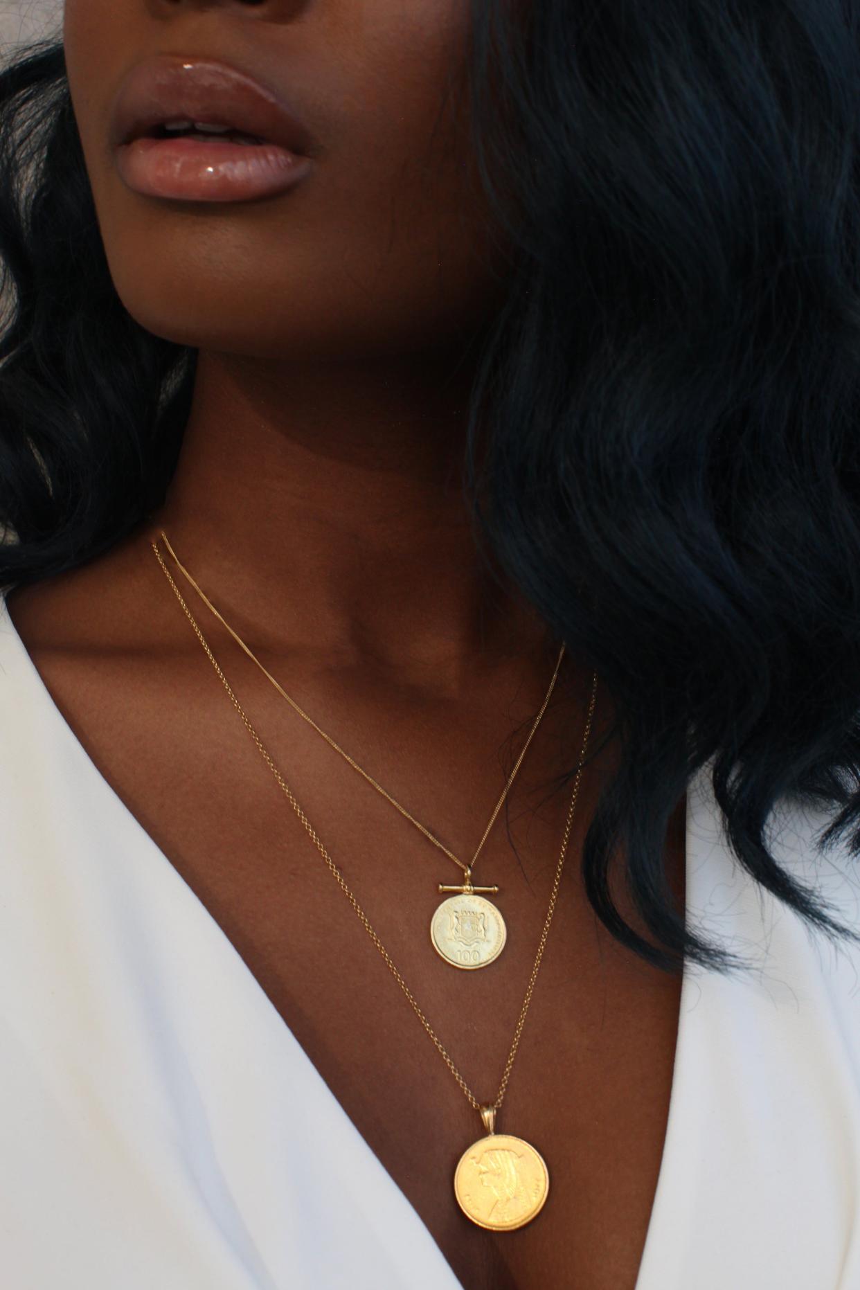 <p><a href="https://omiwoods.com/collections/bestsellers/products/the-double-up-coin-necklace-stack-with-bar-coin?variant=31266338111575" rel="nofollow noopener" target="_blank" data-ylk="slk:Shop Now;elm:context_link;itc:0;sec:content-canvas" class="link rapid-noclick-resp">Shop Now</a></p><p>Double Up Coin Necklace Stack</p><p>omiwoods.com</p><p>$179.00</p>