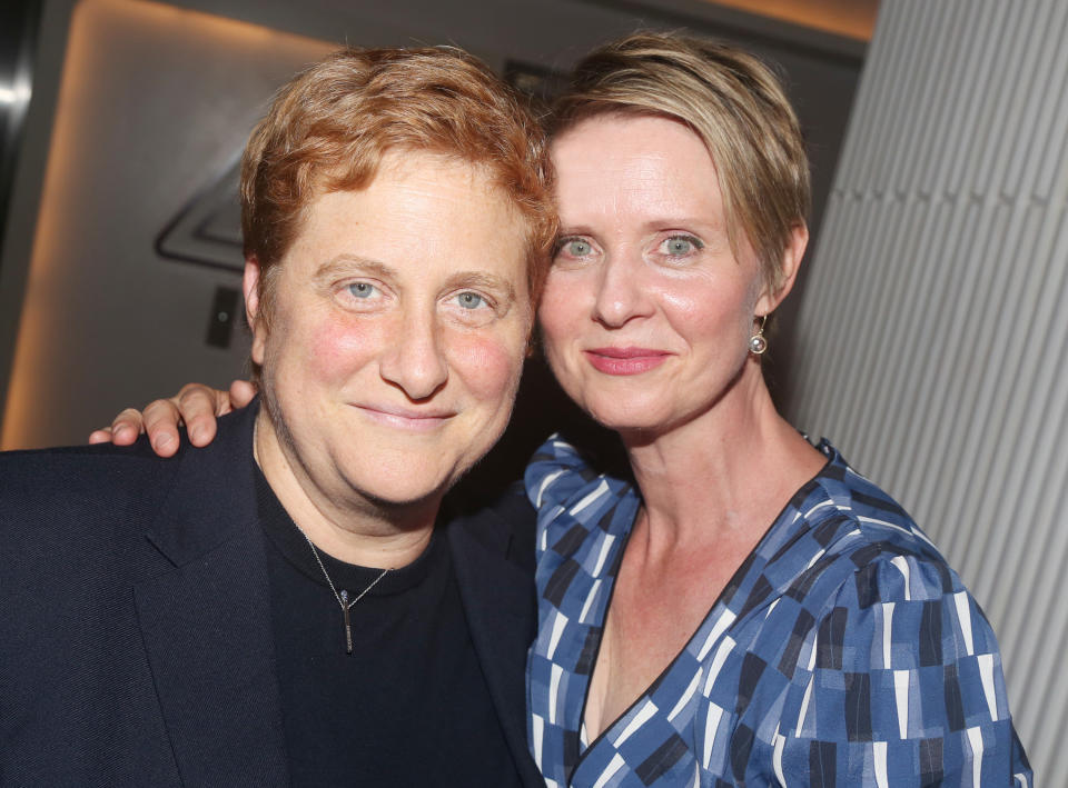 Christine Marinoni and wife Cynthia Nixon pose at the opening night after party for The New Group Theater production of "The True"at Yotel's Green Fig Urban Eatery on September 20, 2018 in New York City