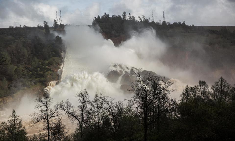 65,000 cfs of water flow through a damaged spillway on the Oroville Dam in Oroville, California, U.S., February 10, 2017. (Max Whittaker/Reuters)