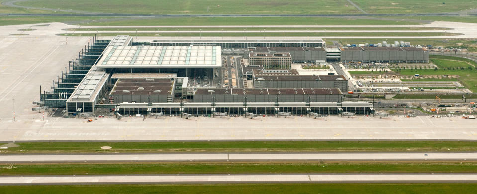 File - This June 27, 2012 file picture shows an aerial view of the new Berlin Airport, Willy Brandt (BER). The opening of Berlin's new airport may be postponed for a fourth time - the latest delay in a project that has turned into a major embarrassment for German officials. The Willy Brandt airport was originally slated to open in 2011. After two delays last year, it was supposed to open on Oct. 27, 2013. But Transport Ministry spokesman Sebastian Rudolph said Monday Jan. 7, 2013 that officials were told last week airport managers see new "major" problems. He didn't elaborate. Germany's Bild newspaper, citing internal documents, reported that the airport won't be able to open before 2014 at the earliest. (AP Photo/ dapd/ Klaus-Dietmar Gabbert,File)