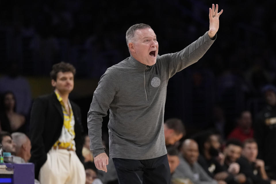 Denver Nuggets head coach Michael Malone yells form the bench in the second half of Game 4 of the NBA basketball Western Conference Final series against the Los Angeles Lakers Monday, May 22, 2023, in Los Angeles. (AP Photo/Ashley Landis)