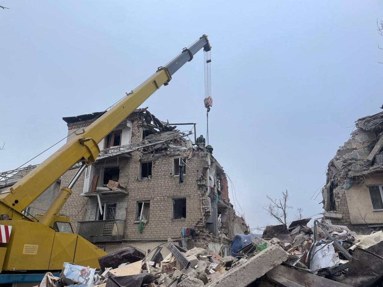 Rescuers clearing debris of a residential building damaged after a Russian strike in Selydove, Donetsk region, last week (AFP via Getty Images)
