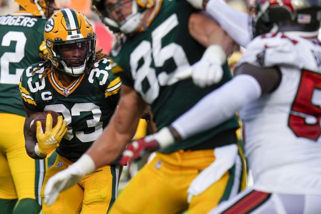 Aaron Jones' contract restructure could save Packers almost $12M on the  salary cap in 2023