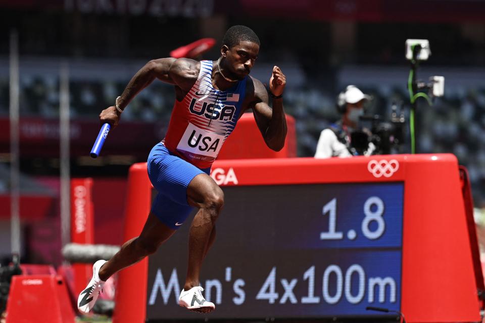 Trayvon Bromell competes in the men’s 4x100m relay heats (AFP)