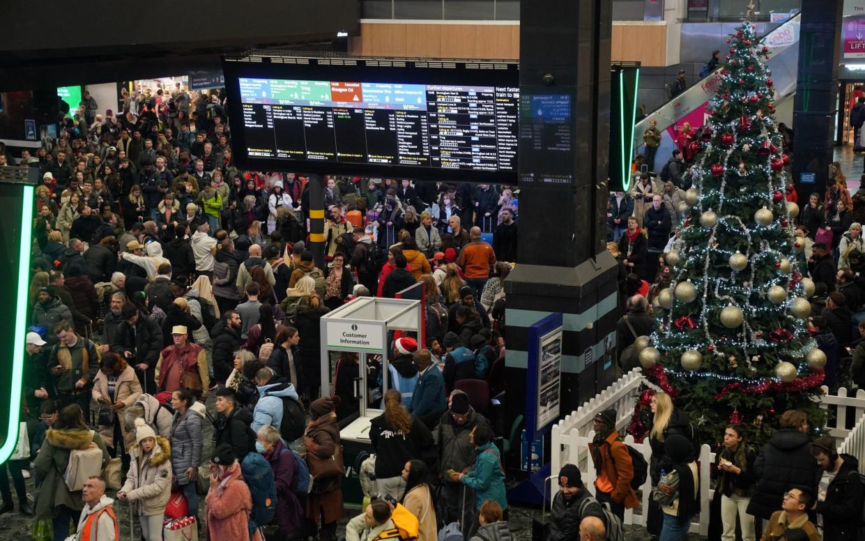 Travellers at Euston station on Friday afternoon