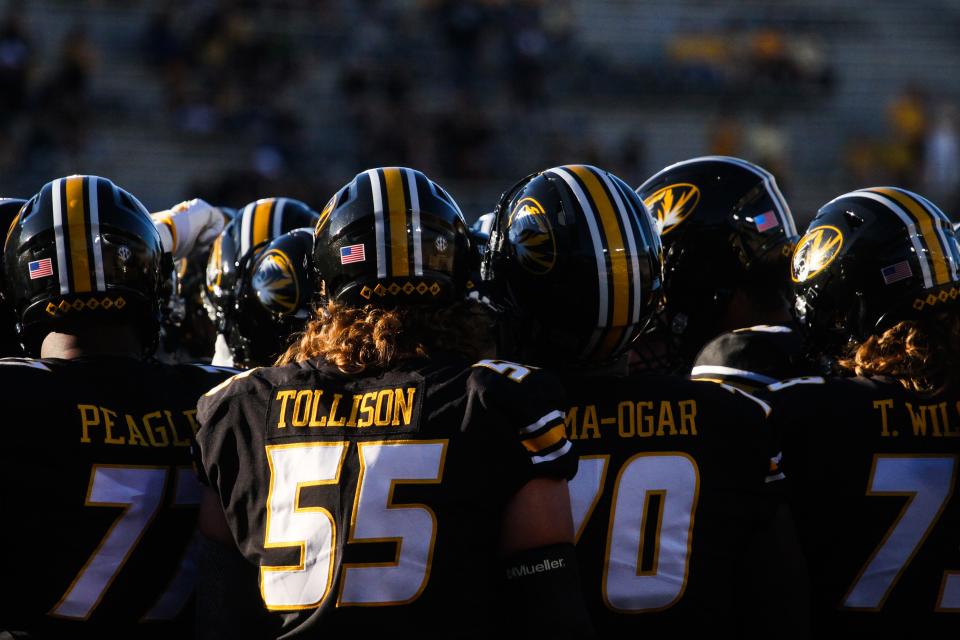 The Missouri offensive line huddles before MU's 35-10 win over South Dakota at Memorial Stadium on August 31, 2023, in Columbia, Mo.