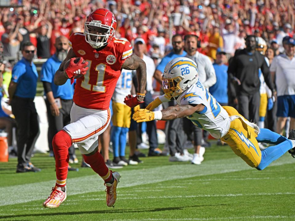 Marquez Valdes-Scantling evades a tackle during an October matchup against the Los Angeles Chargers.