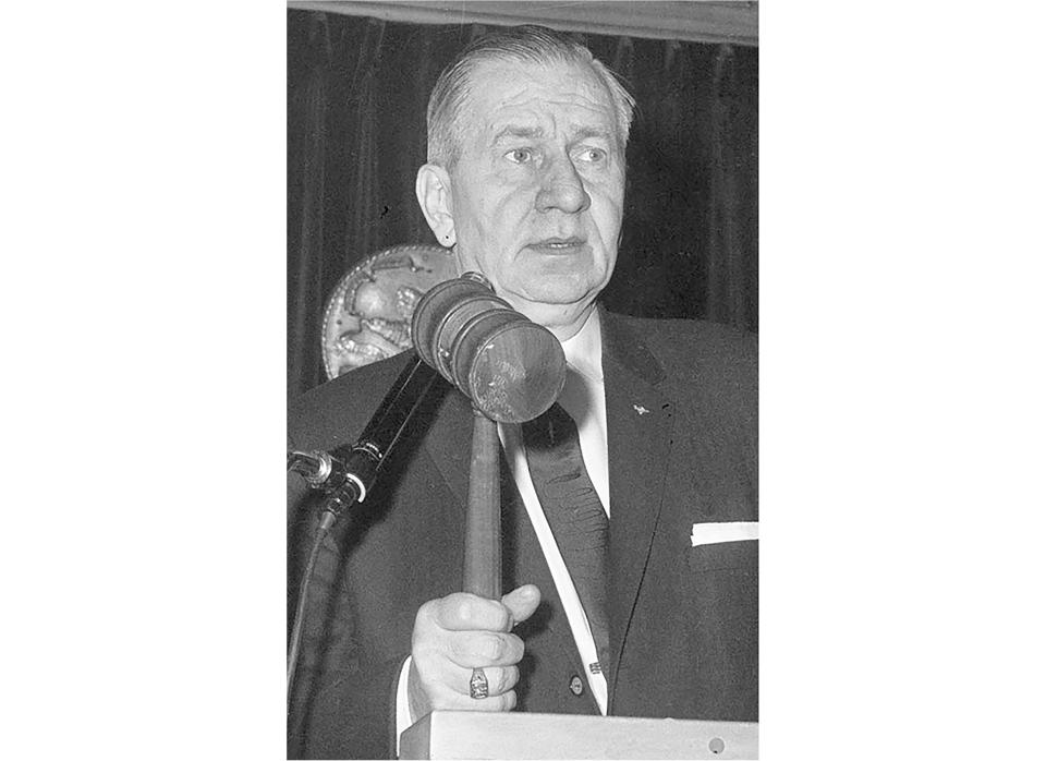 FILE - Former Illinois Secretary of State Paul Powell holds a gavel in this 1961 photo. Powel made headlines for the $800,000 in cash stuffed in shoeboxes found when he died. For more than half a century, a Powell-established $250,000 trust sustained his legacy, for better or worse. But the account that maintained his birthplace as a museum will soon run dry. (AP Photo/File)