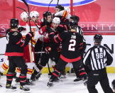 Tempers fly between the Ottawa Senators and the Calgary Flames during second period NHL hockey action in Ottawa on Monday, March 1, 2021. (Sean Kilpatrick/The Canadian Press via AP)