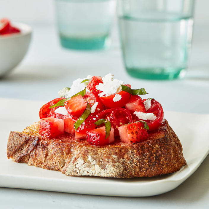 <p>These topped toasts get a sweet-salty punch from the addition of strawberries and ricotta salata—a firm, saltier version of ricotta cheese. Look for it with other specialty cheeses at the supermarket, or substitute Parmigiano-Reggiano or pecorino. <a href="https://www.eatingwell.com/recipe/7901677/cherry-tomato-strawberry-bruschetta/" rel="nofollow noopener" target="_blank" data-ylk="slk:View Recipe" class="link ">View Recipe</a></p>
