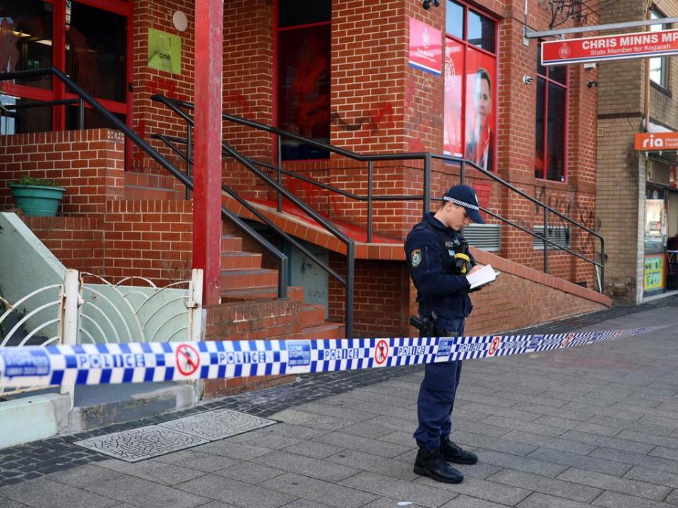 SYDNEY, AUSTRALIA - NewsWire Photos - 03 JUNE, 2024: The offices of NSW Premier Chris Minns in Kogarah are pictured covered with red "blood" paint and the word 'murder' spray-painted on the side of the building. Local NSW Police established a crime scene and are investigating. Picture: NewsWire / Nicholas Eagar