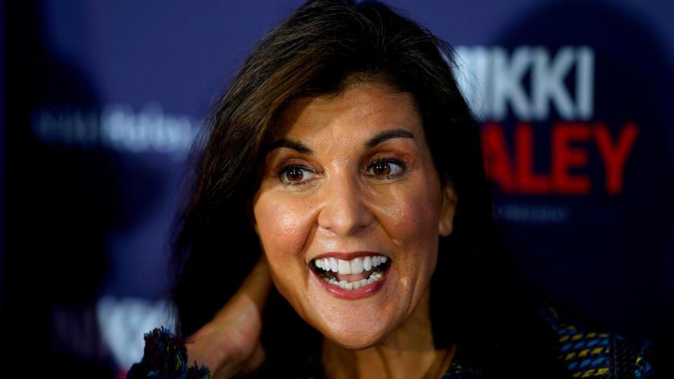 PHOTO: Republican presidential candidate Nikki Haley greets audience members during a town hall, Nov. 17, 2023, in Ankeny, Iowa. (Charlie Neibergall/AP)