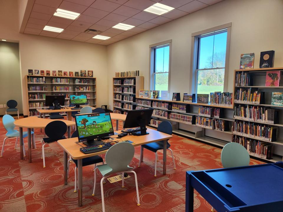 The new library features a children’s area with interactive games and story time space.
