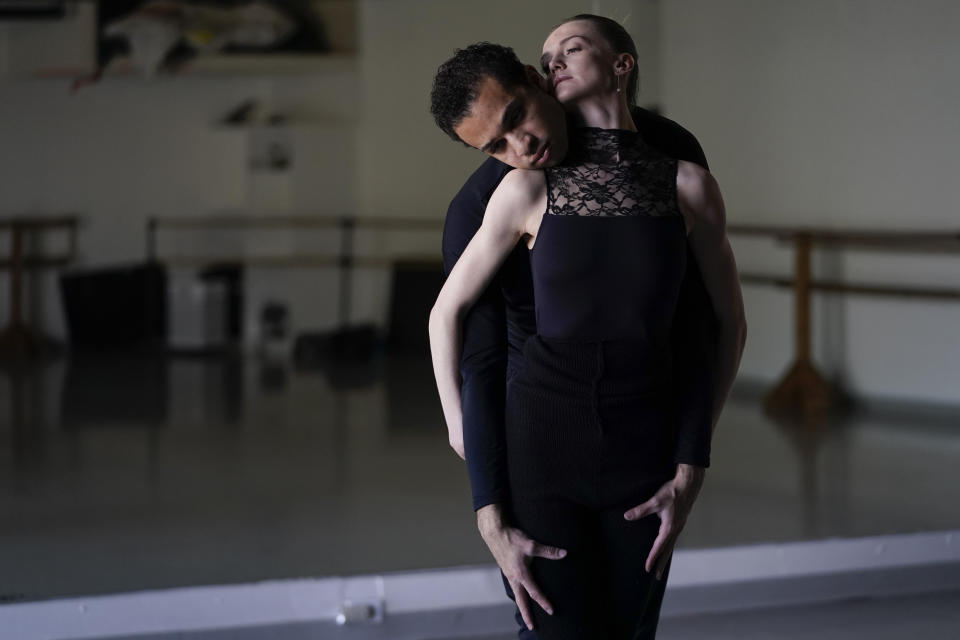 Adrian Blake Mitchell, left, and Andrea Laššáková pose for a photo on Monday, April 18, 2022, in Santa Monica, Calif. The dancers left their positions at the Mikhailovsky Ballet Theatre in St. Petersburg and fled Russia ahead of the invasion of Ukraine. (AP Photo/Ashley Landis)
