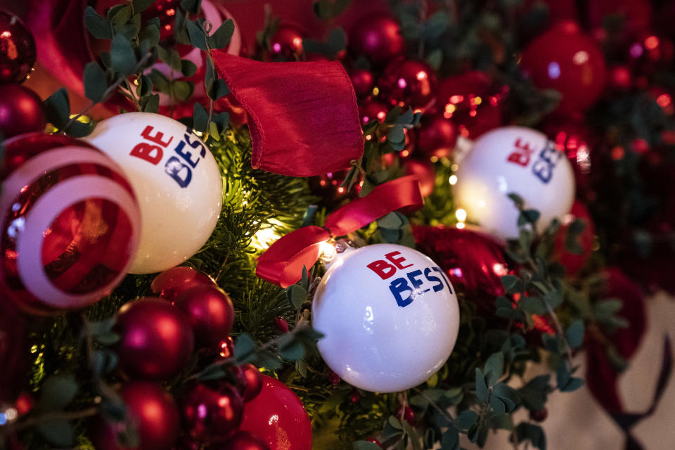 Ornaments with the First Lady’s Be Best initiative logo hang over a mantle during the White House Christmas preview in the Red Room of the White House on Monday, Nov. 26, 2018 in Washington, D.C. (Photo: Jabin Botsford/The Washington Post via Getty Images)