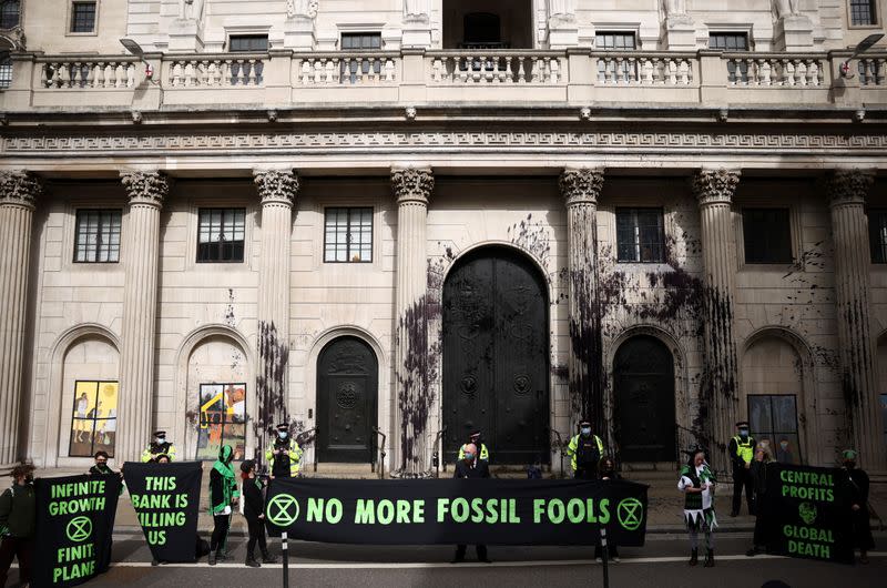 Extinction Rebellion activists protest outside the Bank of England