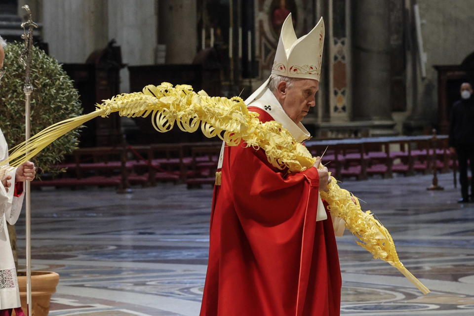 Pope Francis celebrates Palm Sunday Mass in Saint Peter's Basilica at the Vatican, Sunday, March 28, 2021. (Giuseppe Lami/Pool photo via AP)