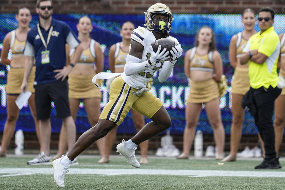 Georgia Tech wide receiver Eric Singleton Jr. (13) makes a touchdown catch against South Carolina State during the first half of an NCAA college football game, Saturday, Sept. 9, 2023, in Atlanta. (AP Photo/Mike Stewart)