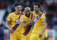 Britain Football Soccer - Liverpool v Crystal Palace - Premier League - Anfield - 23/4/17 Crystal Palace's Luka Milivojevic and Andros Townsend celebrate after the match Action Images via Reuters / Paul Childs Livepic