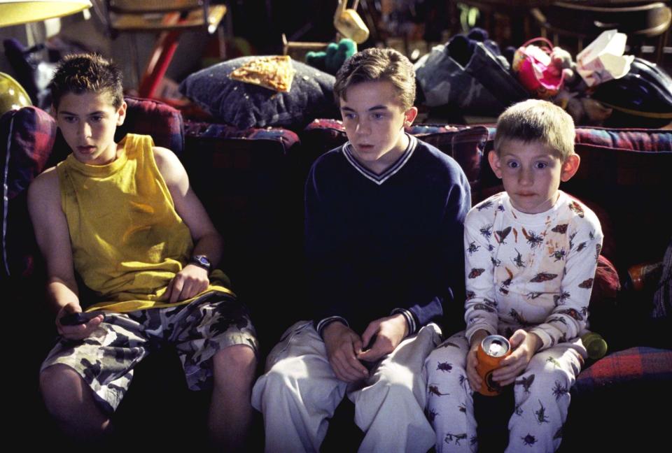 Frankie Muniz as Malcolm with his brothers in Malcolm in the Middle