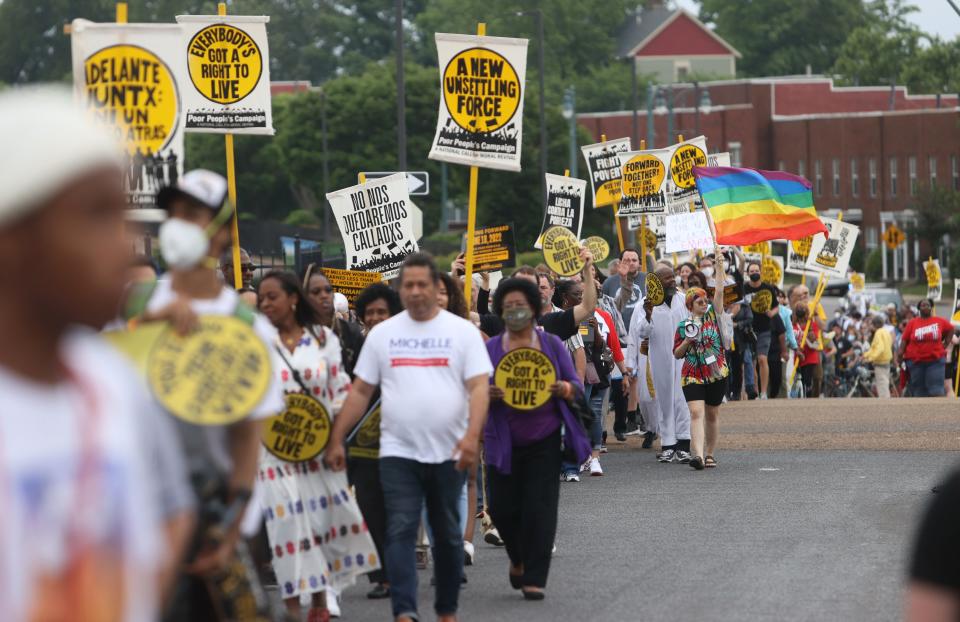 People march through the streets of Downtown Memphis, from Robert R. Church Park to the National Civil Rights Museum, with the Poor People's Campaign: A National Call for Moral Revival championing social justice movements on Monday, May 23, 2022.