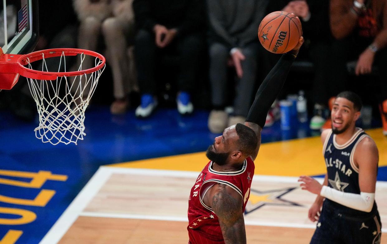 Western Conference forward LeBron James (23) of the Los Angeles Lakers goes up for a dunk Sunday, Feb. 18, 2024, during the 73rd NBA All-Star game at Gainbridge Fieldhouse in downtown Indianapolis.