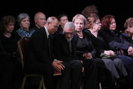 Russian President Vladimir Putin pays respect to founder of Russia’s oldest human rights group and Sakharov Prize winner Lyudmila Alexeyeva in Moscow, Russia December 11, 2018. REUTERS/Maxim Shemetov