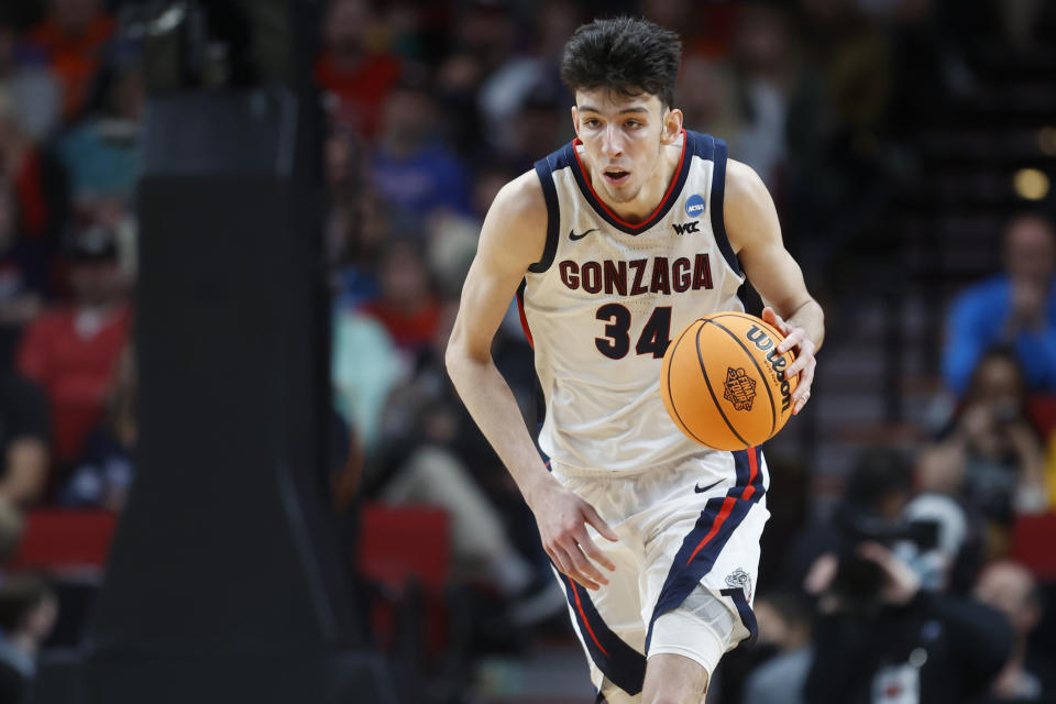 FILE - Gonzaga center Chet Holmgren brings the ball up against Georgia State during the second half of a first-round NCAA college basketball tournament game March 17, 2022, in Portland, Ore. Holmgren is one of the top forwards in the upcoming NBA draft. (AP Photo/Craig Mitchelldyer, File)