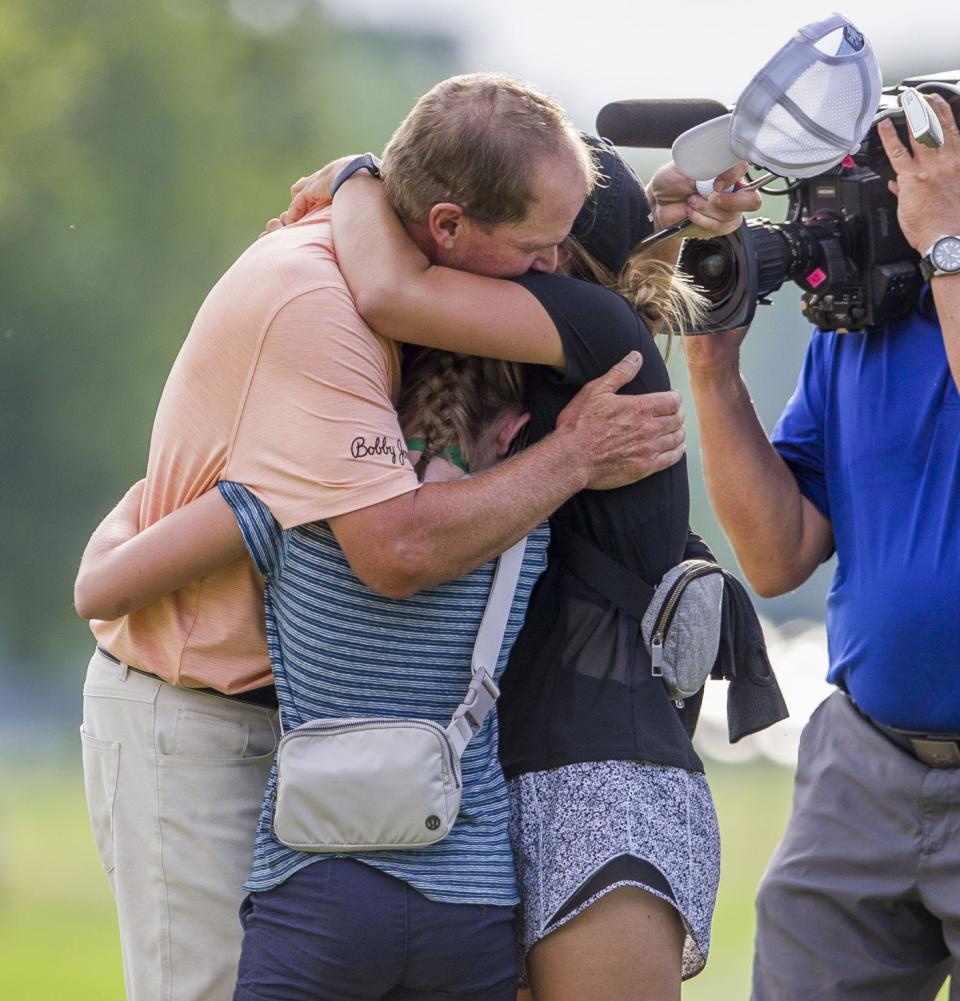 Steve Stricker hugs family members after winning the U.S. Senior Open Sunday at Notre Dame’s Warren Golf Course.