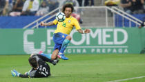 Football Soccer - Brazil v Paraguay - World Cup 2018 Qualifiers - Arena Corinthians stadium, Sao Paulo, Brazil - 28/3/17 - Brazil's Marcelo (16) scores a goal against Paraguay's goalkeeper Antony Silva. REUTERS/Nacho Doce