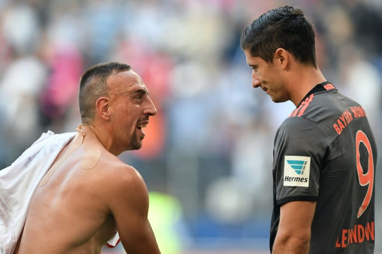 Bayern Munich's French midfielder Franck Ribery (L) took a patronising pinch of Mueller's cheek following a tussle midway through the second-half which escaped the referee's attention