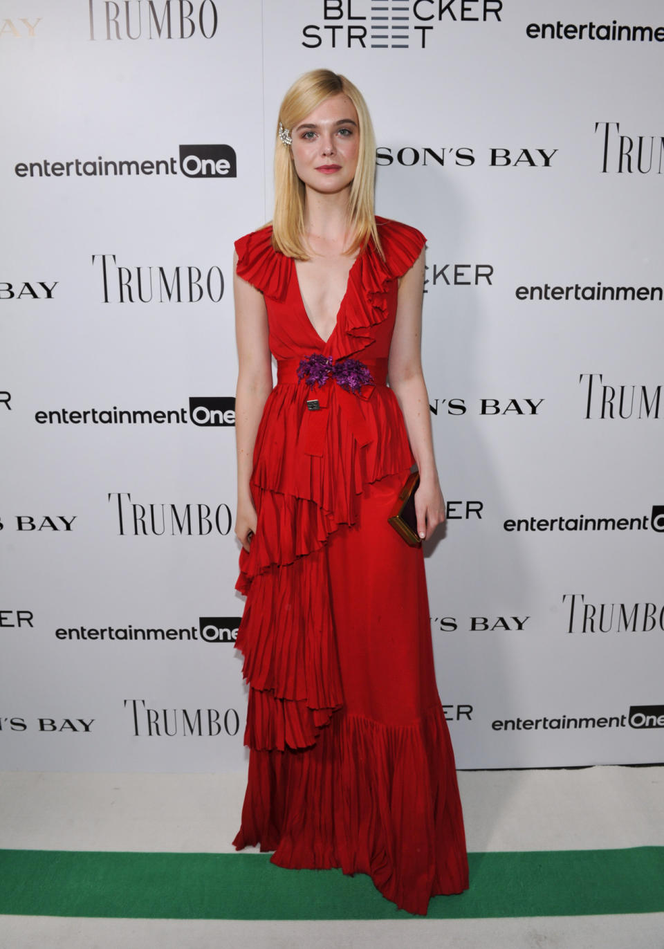 Elle Fanning in a pleated red Gucci gown.