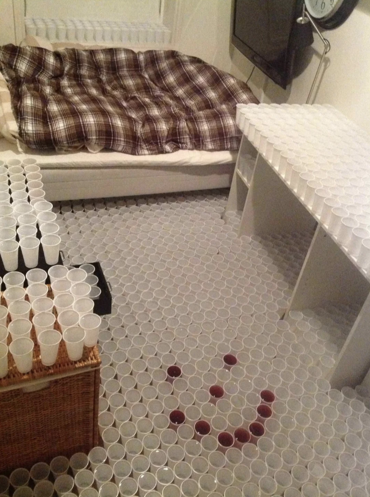 Water cups all over someone's room